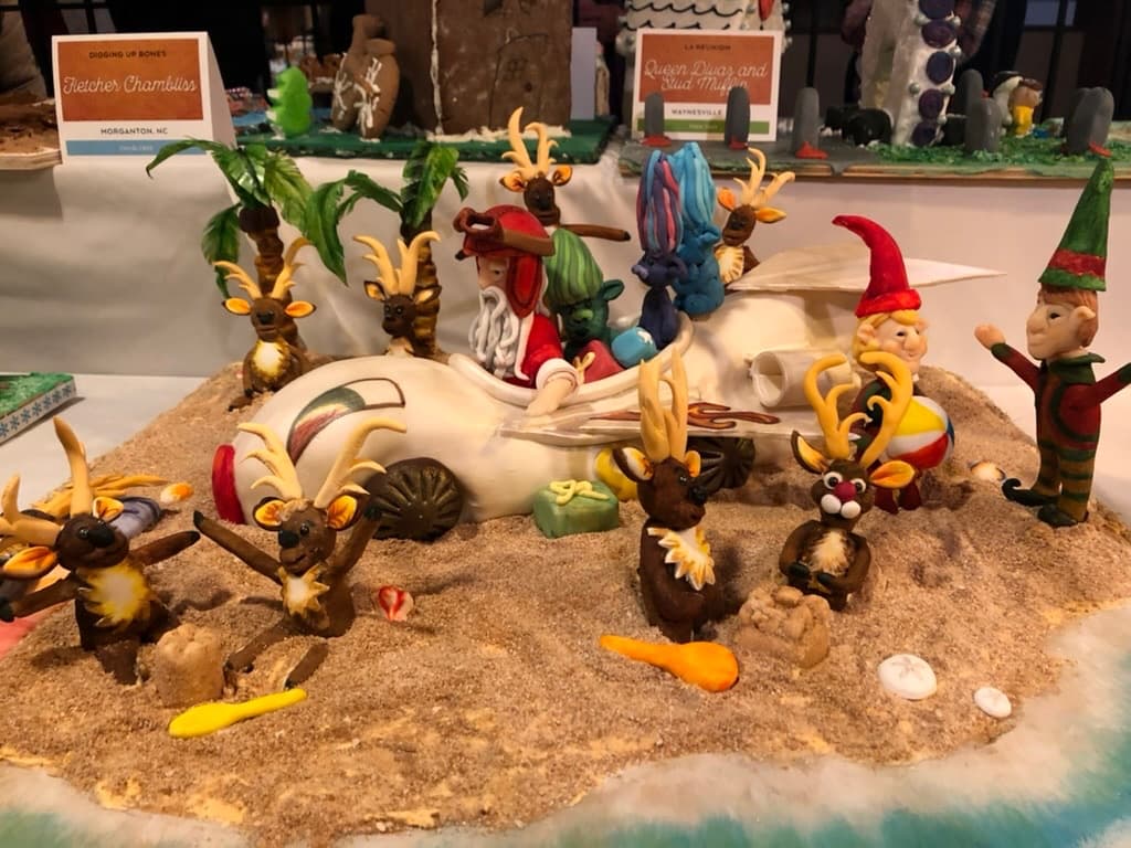 A gingerbread competition entry of Santa and reindeer on a beach