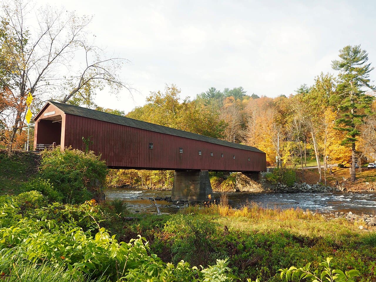West Cornwall Covered Bridge crossing the Housatonic River in autumn