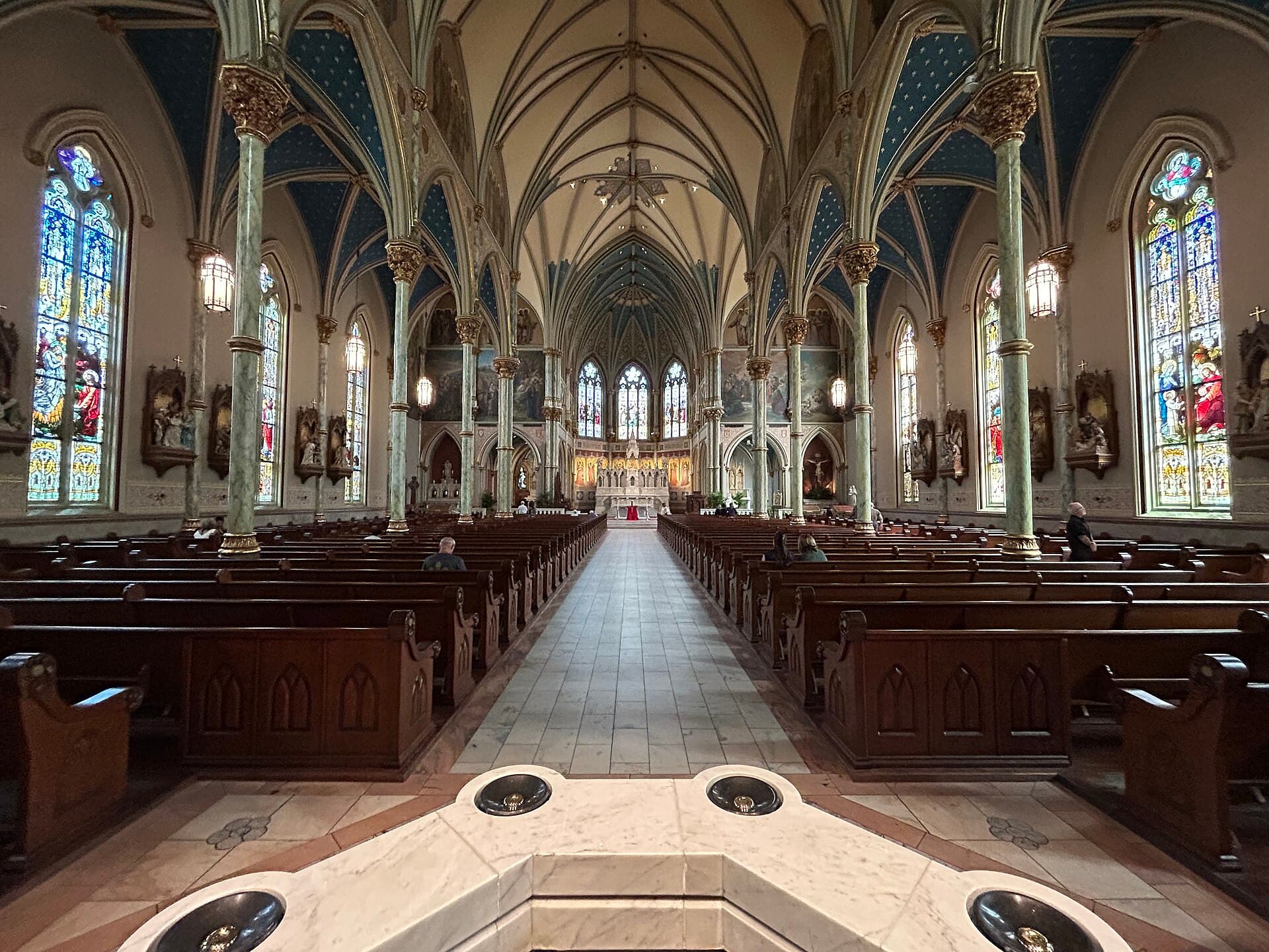 Nave and stained glass of the Cathedral Basilica of St. John the Baptist