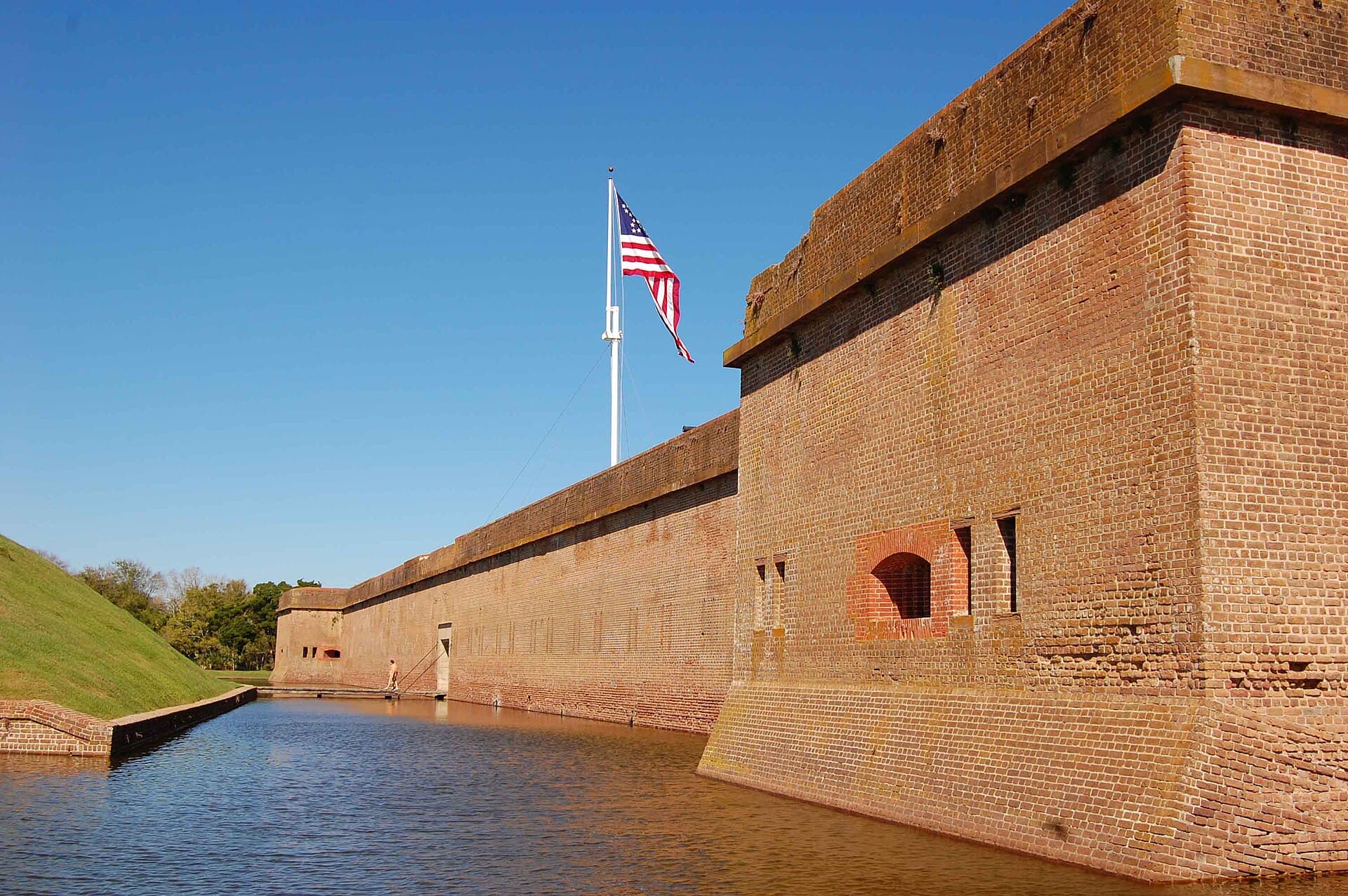 Brick ramparts and moat of Fort Pulaski National Monument